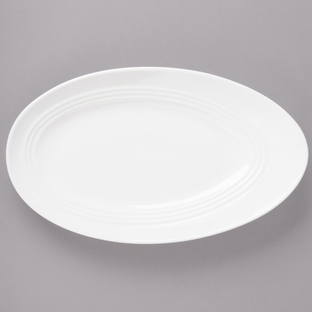 Bon Chef 1100010P Slanted Oval 14" x 8 3/8" White Porcelain Plate - 12/Pack