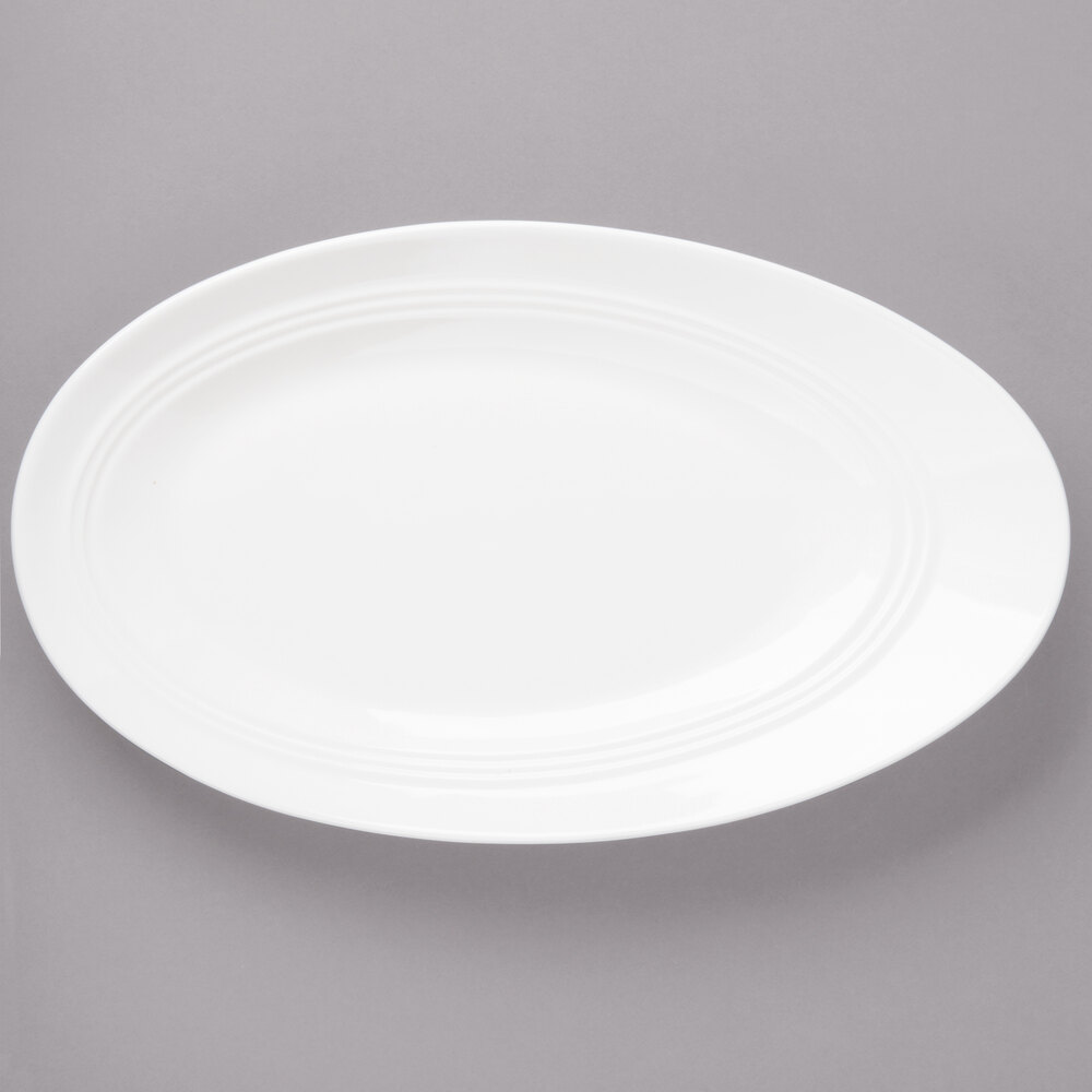 Bon Chef 1100011P Slanted Oval 16" x 9 7/16" White Porcelain Plate - 12/Pack