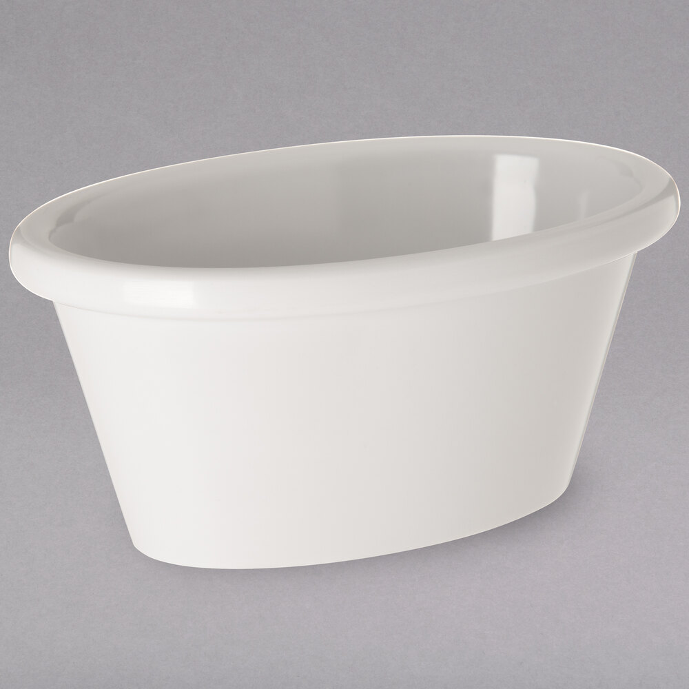 Carlisle S31442 4 oz. Ivory Bone Melamine Oval Ramekin - 48/Case