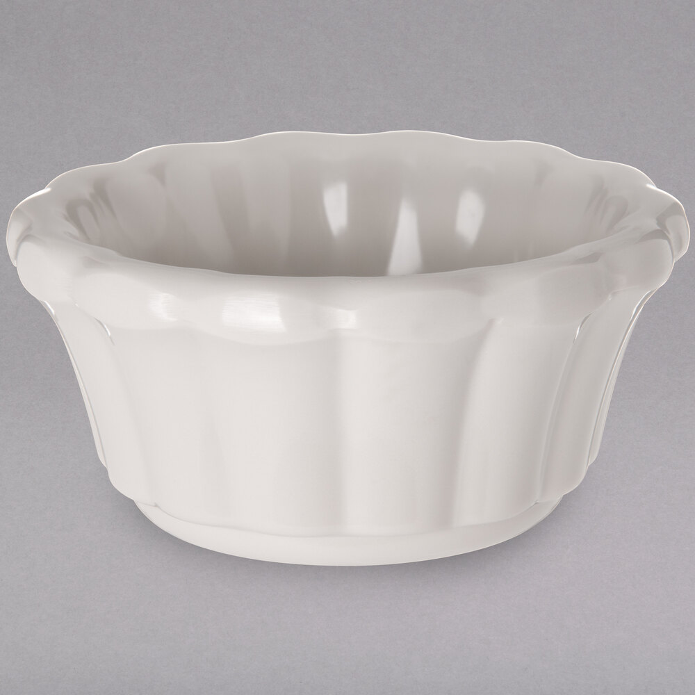 Carlisle 4394342 2 oz. Ivory Bone Scalloped Melamine Ramekin - 48/Case