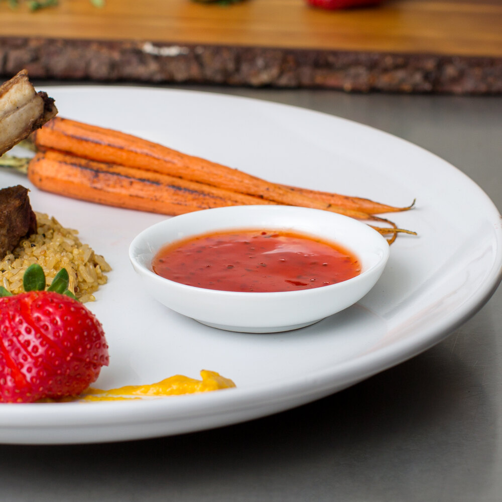 Acopa 2 oz. Bright White Porcelain Round Sauce Cup / Sake Cup - 12/Pack