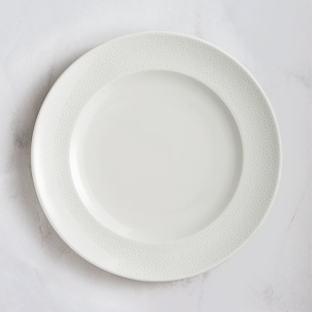 RAK Porcelain Choice 10 5/8" Ivory Embossed Wide Rim Porcelain Flat Plate - 12/Case