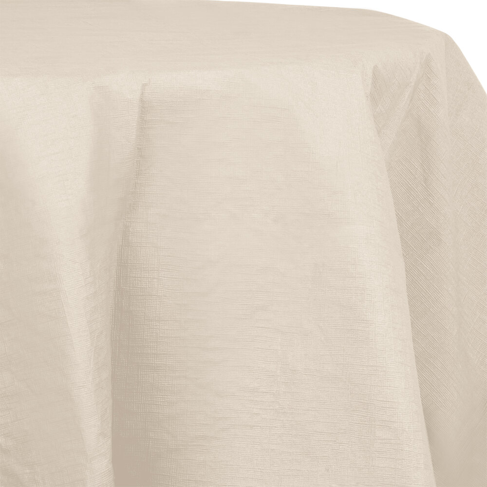 Creative Converting 923264 82" Ivory OctyRound Tissue / Poly Table Cover - 12/Case